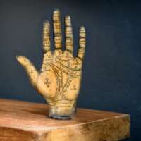 old-tarot-hand-showing-the-zones-of-the-palm-e1632813172189